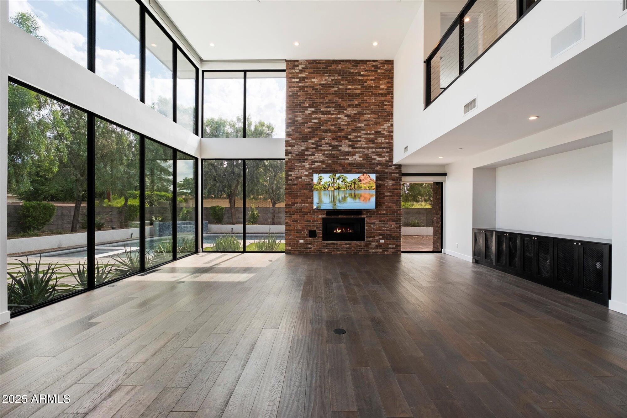 4525 North 36th Way Phoenix, AZ 85018 - Photo 9 of 40 a view of an entryway with wooden floor