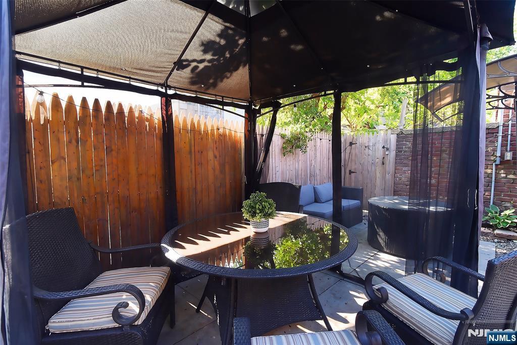 22 8th Avenue Newark, NJ 07104 - Photo 25 of 26 a outdoor dining space with furniture