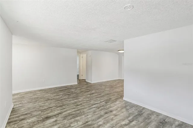 a view of a room that has a window in it