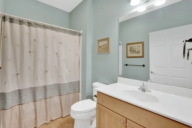 a workspace with furniture and a window