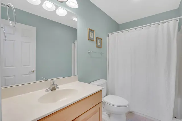 a bedroom with a bed and a closet