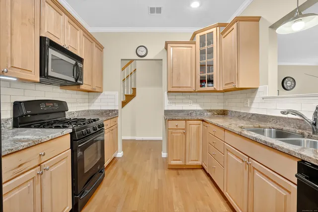 a bedroom with furniture and a bed