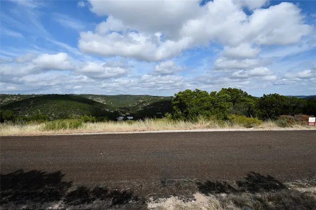 a view of a lake and mountain in the back