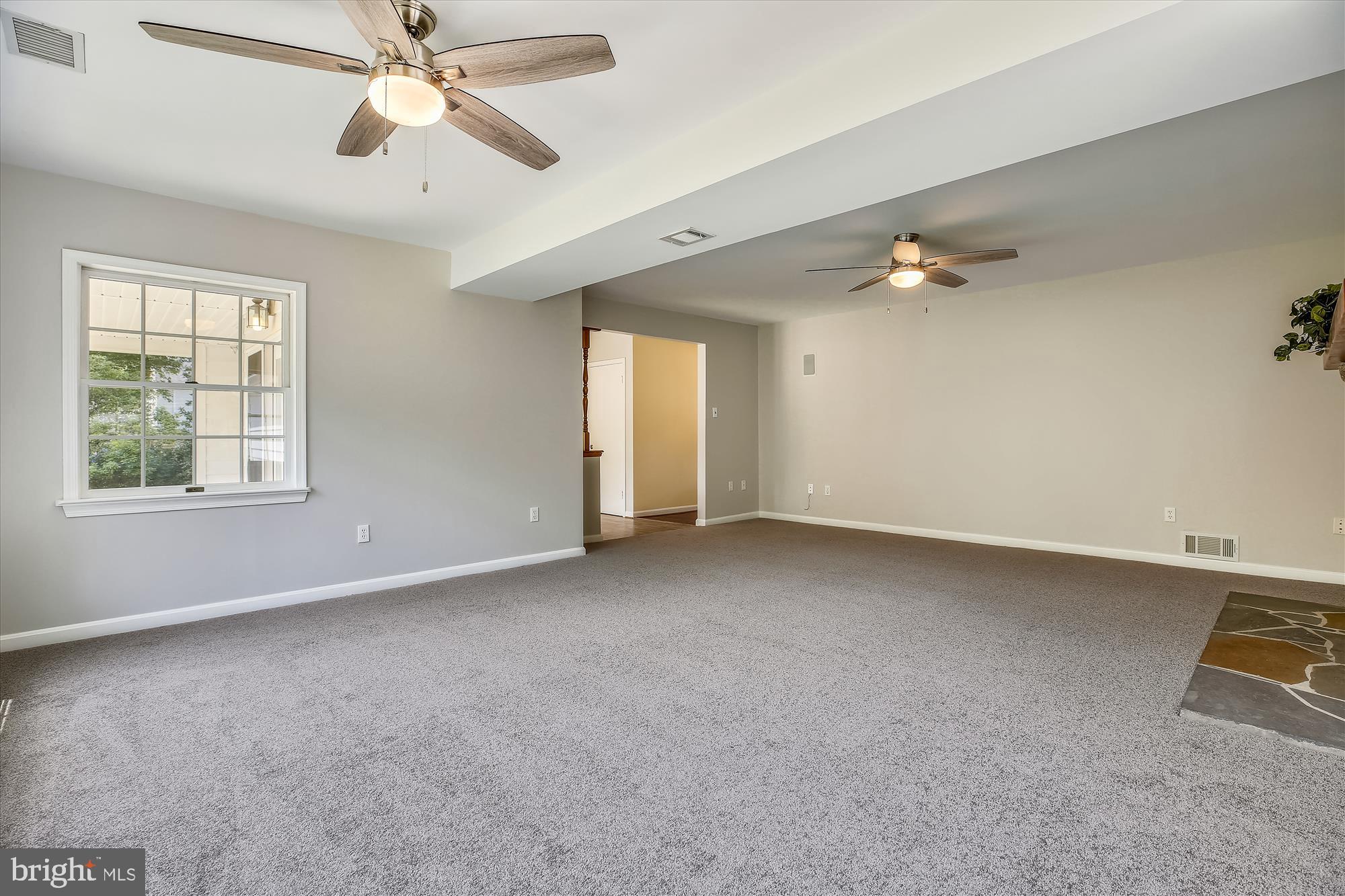 13612 Middlevale Lane Silver Spring, MD 20906 - Photo 17 of 71 Family room with new carpet