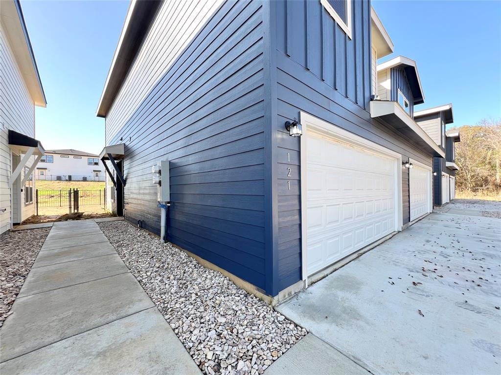 3501 East Renfro Street, Unit 121 Burleson, TX 76028 - Photo 2 of 35 a view of a back yard of the house