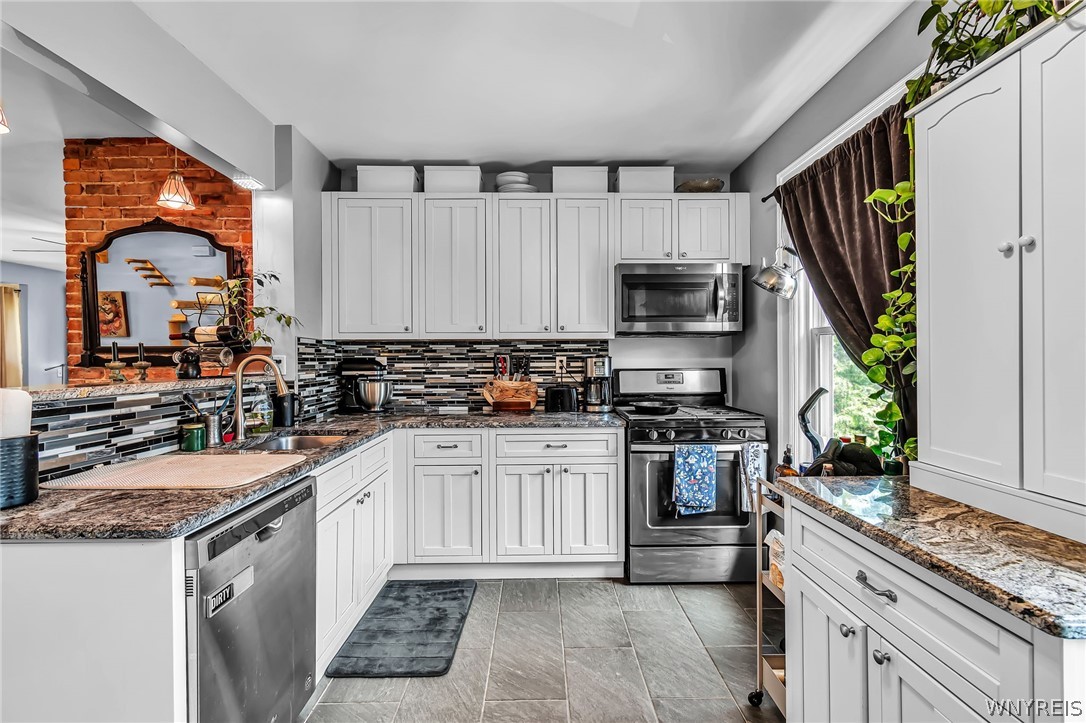 11 15th Street Buffalo, NY 14213 - Photo 30 of 35 Upper kitchen - nice shot of the exposed brick!