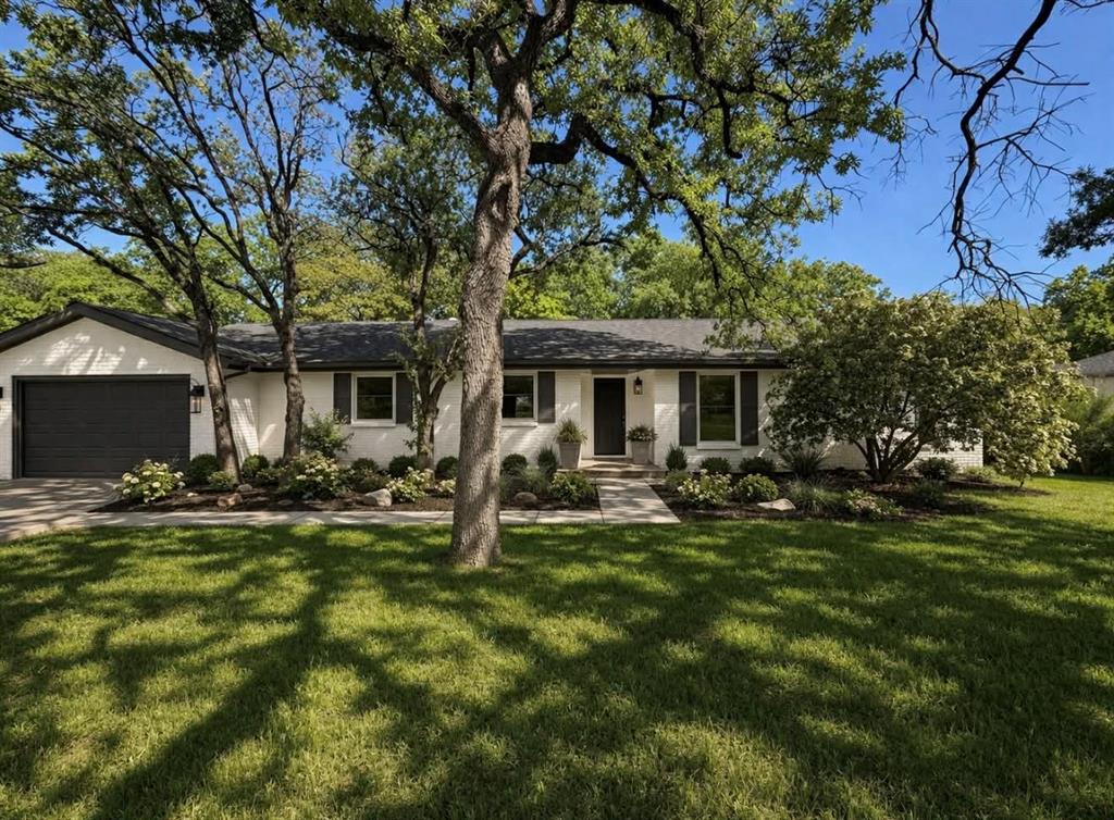 209 Mistletoe Lane Keene, TX 76059 - Photo 1 of 38 a view of a house with backyard porch and sitting area
