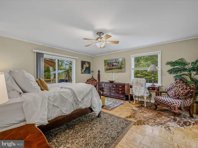 a bed room with a bed and a couch