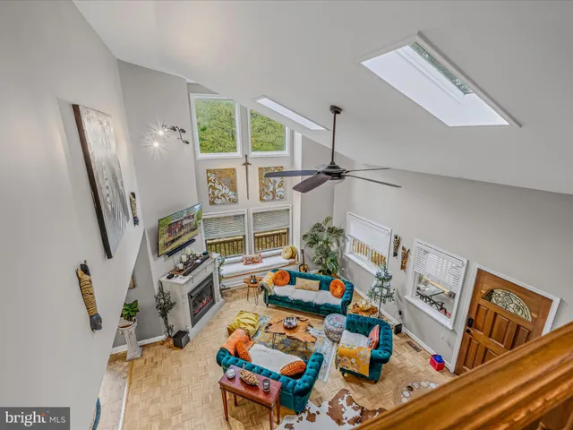 a bedroom with furniture and a flat screen tv