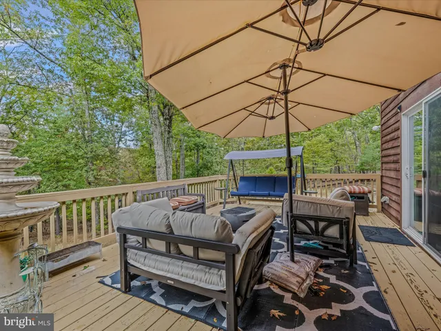 a side view of a house with a yard