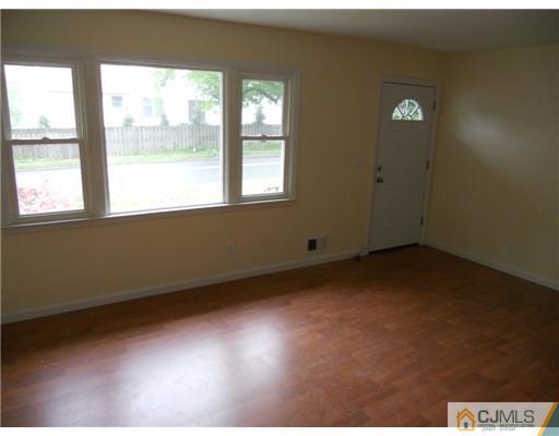 473 Chain O' Hills Road Colonia, NJ 07067 - Photo 6 of 10 an empty room with a window