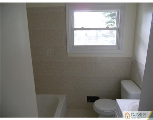 473 Chain O' Hills Road Colonia, NJ 07067 - Photo 7 of 10 a bathroom with a toilet