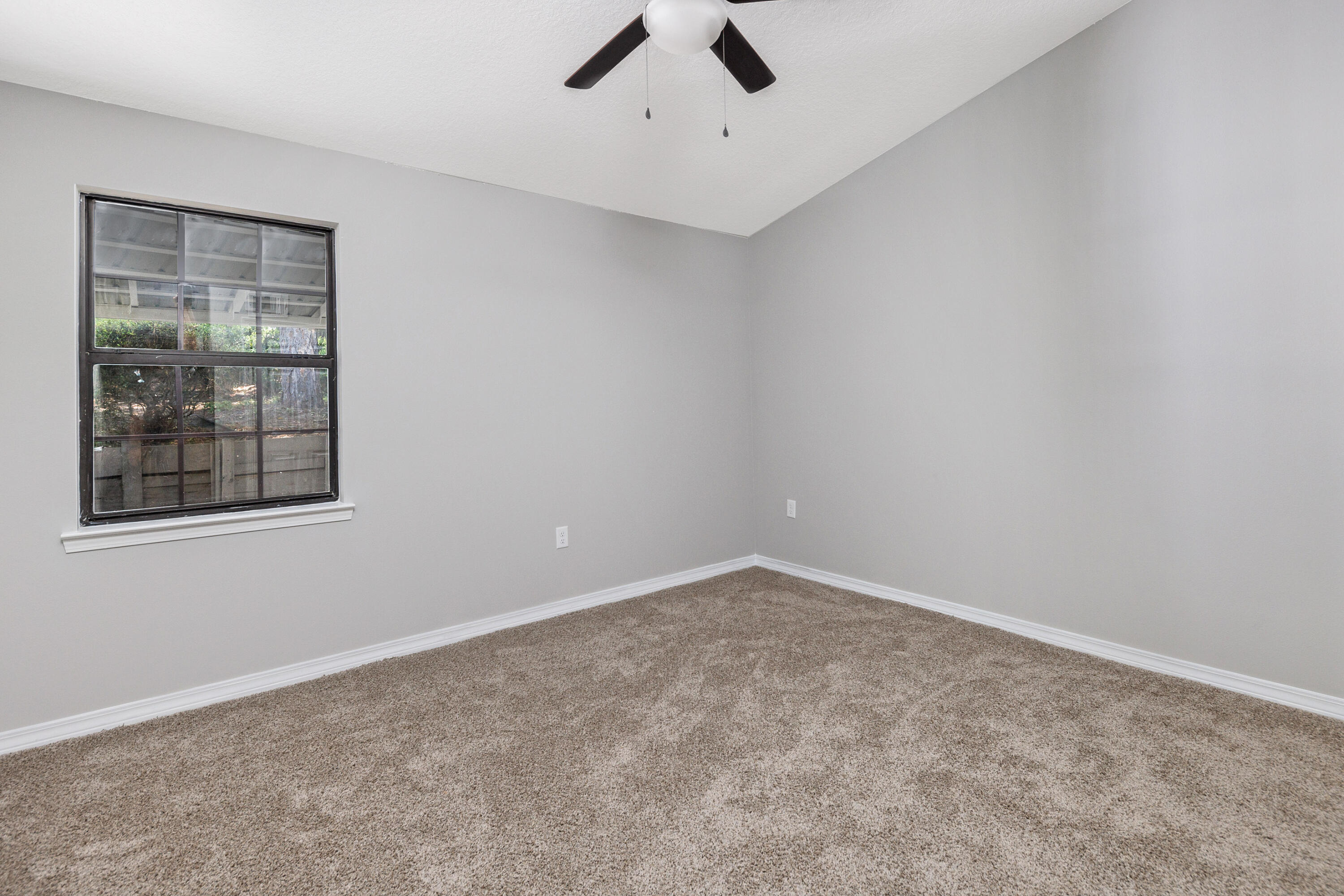 1207 Walter Avenue Crestview, FL 32536 - Photo 14 of 23 an empty room with fan