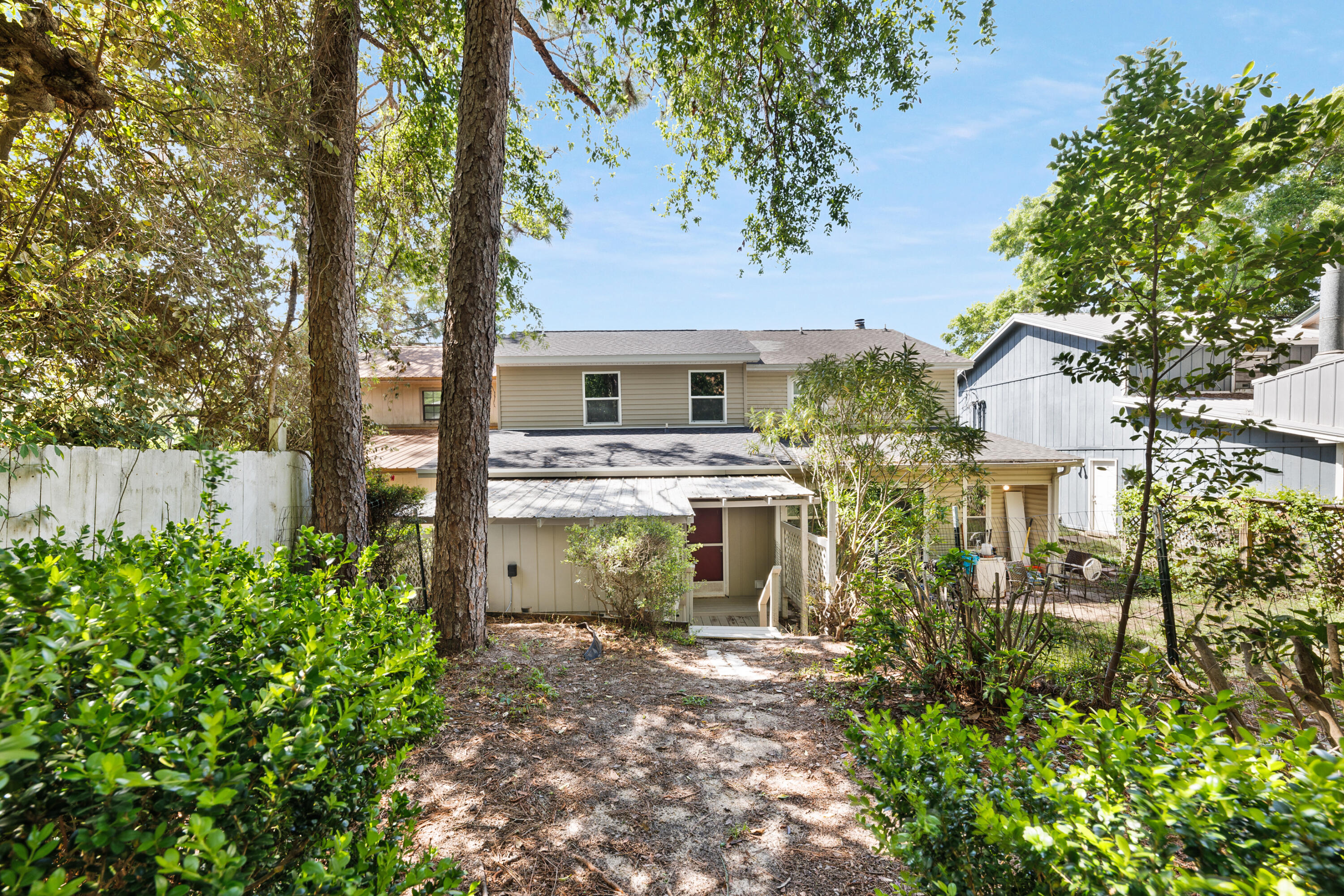 1207 Walter Avenue Crestview, FL 32536 - Photo 20 of 23 front view of a house with a garden
