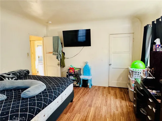 a kitchen with stainless steel appliances granite countertop a refrigerator and a stove