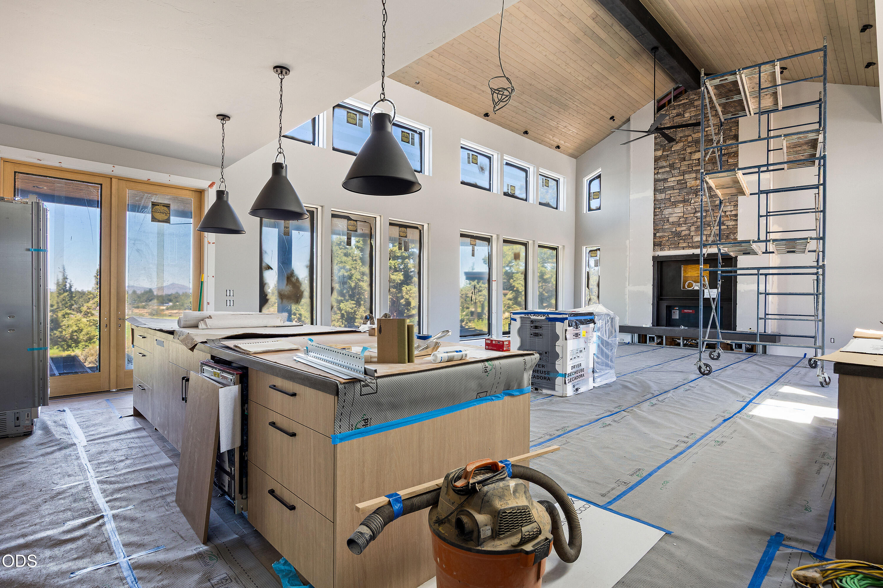 22936 Ghost Tree Lane Bend, OR 97701 - Photo 6 of 45 a kitchen with stainless steel appliances granite countertop a stove and a sink
