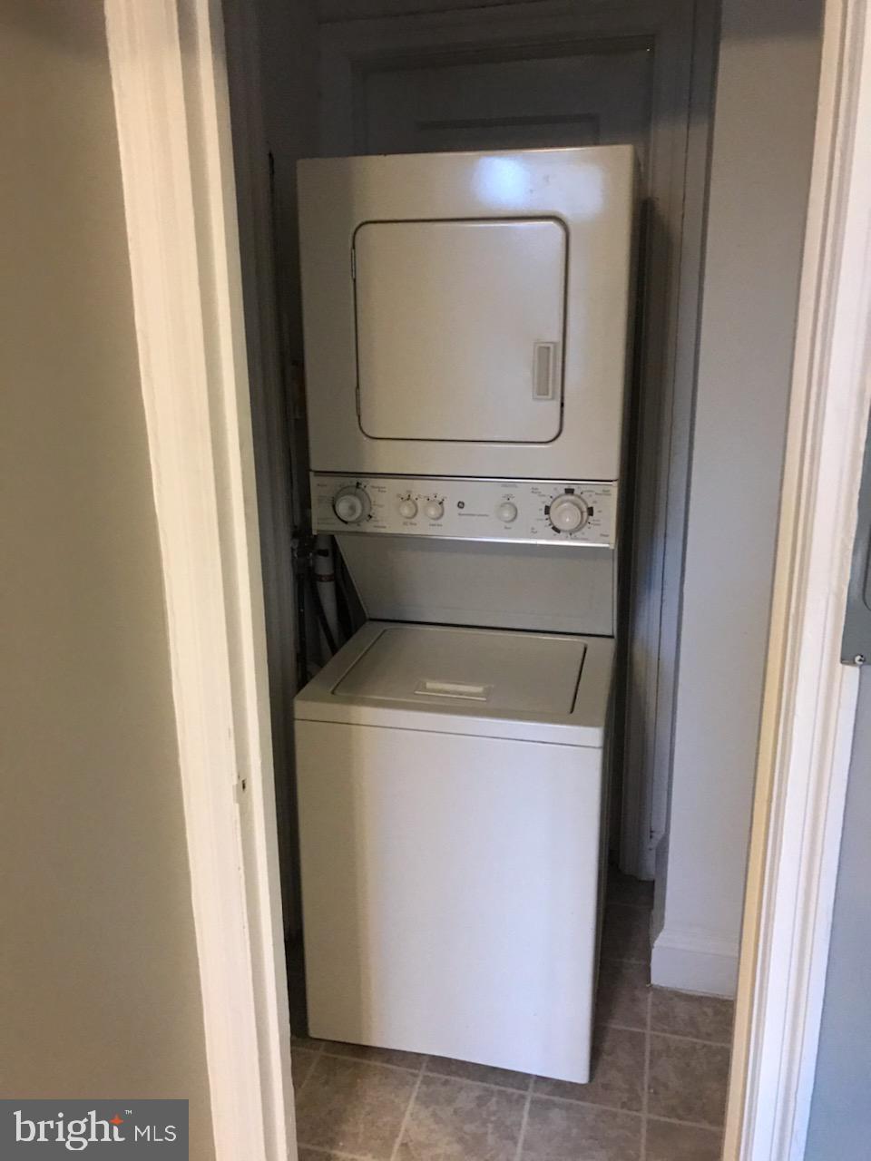 2031 Locust Street, Unit 1404 Philadelphia, PA 19103 - Photo 7 of 20 a utility room with dryer and washer