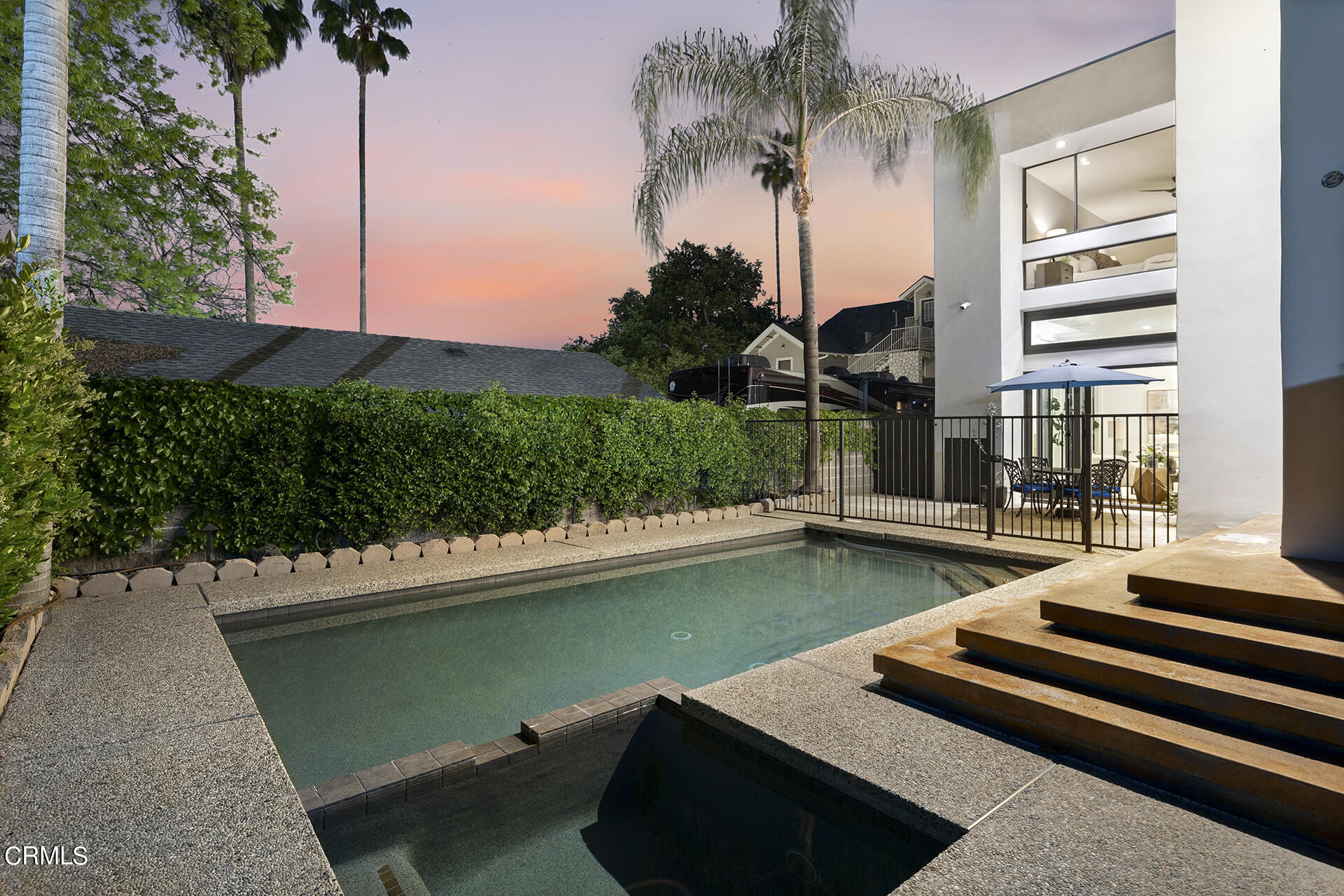 Undisclosed Address Pasadena, CA 91106 - Photo 26 of 31 a view of a patio with swimming pool