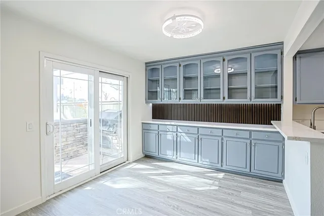 a kitchen with a sink and cabinets