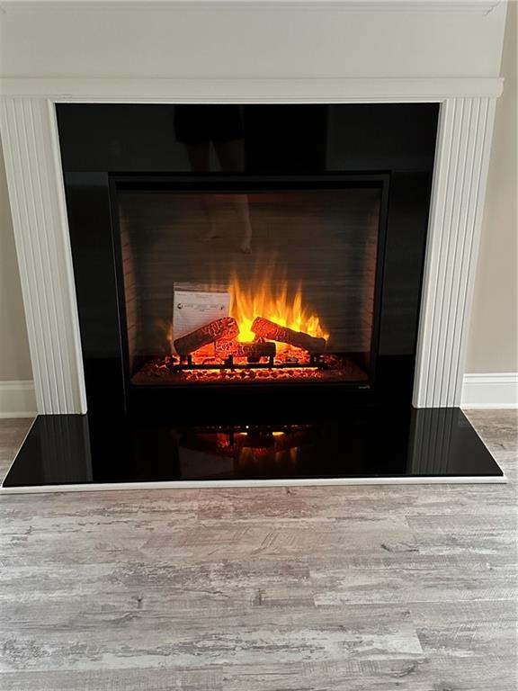 171 Strickland Loop Forsyth, GA 31029 - Photo 9 of 25 a view of a fireplace