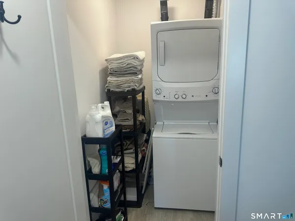 a kitchen with a sink cabinets and window