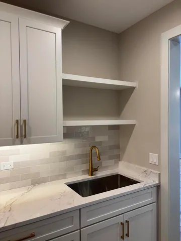 a view of an empty walk in closet