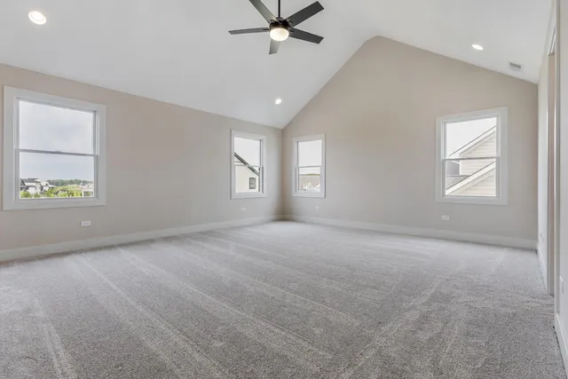 a spacious bathroom with a shower sink mirror and
