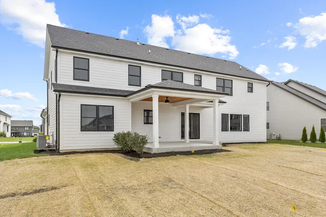 an aerial view of a house with a garden
