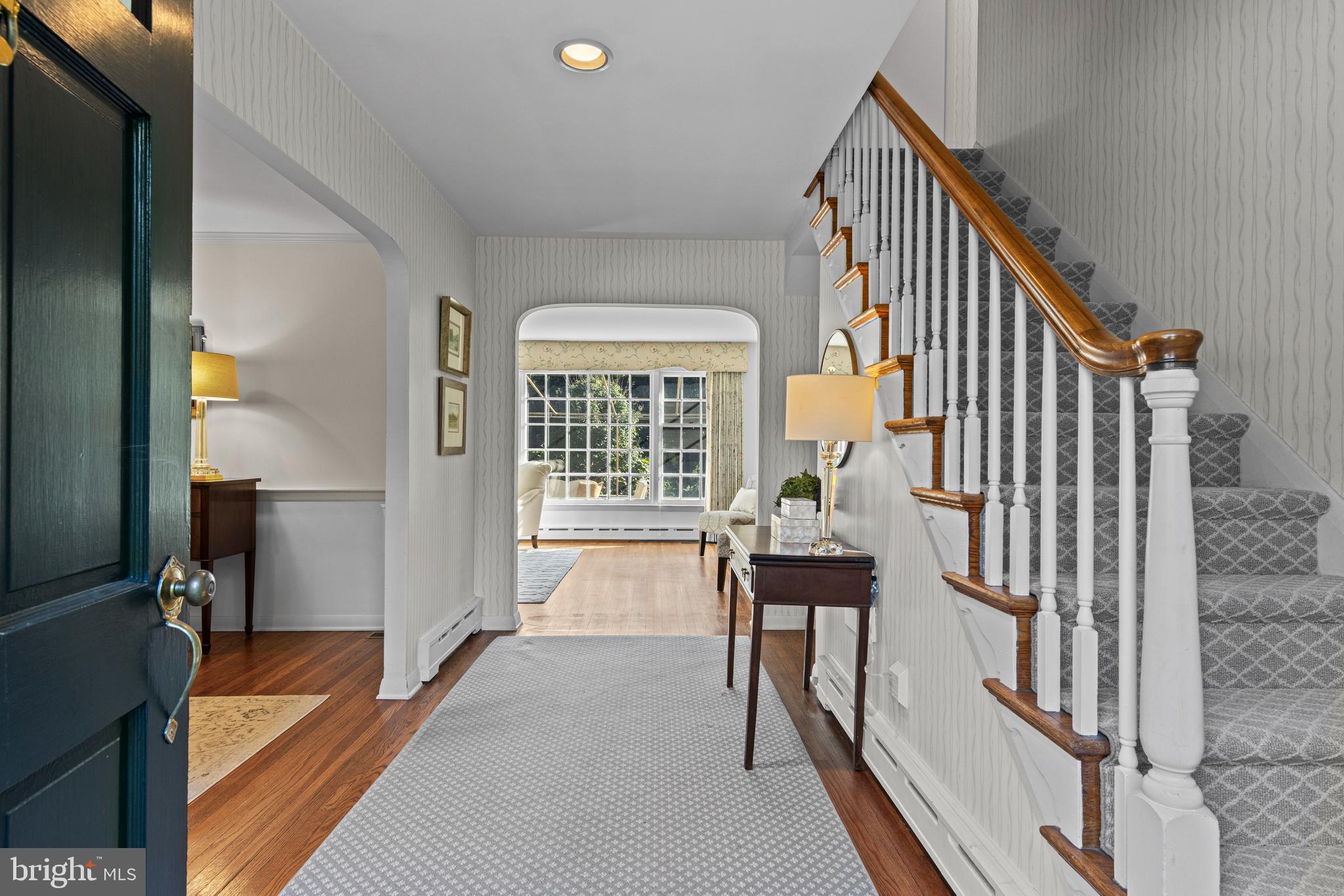 590 Cricket Lane Wayne, PA 19087 - Photo 12 of 65 a view of a hallway with furniture and floor to ceiling window
