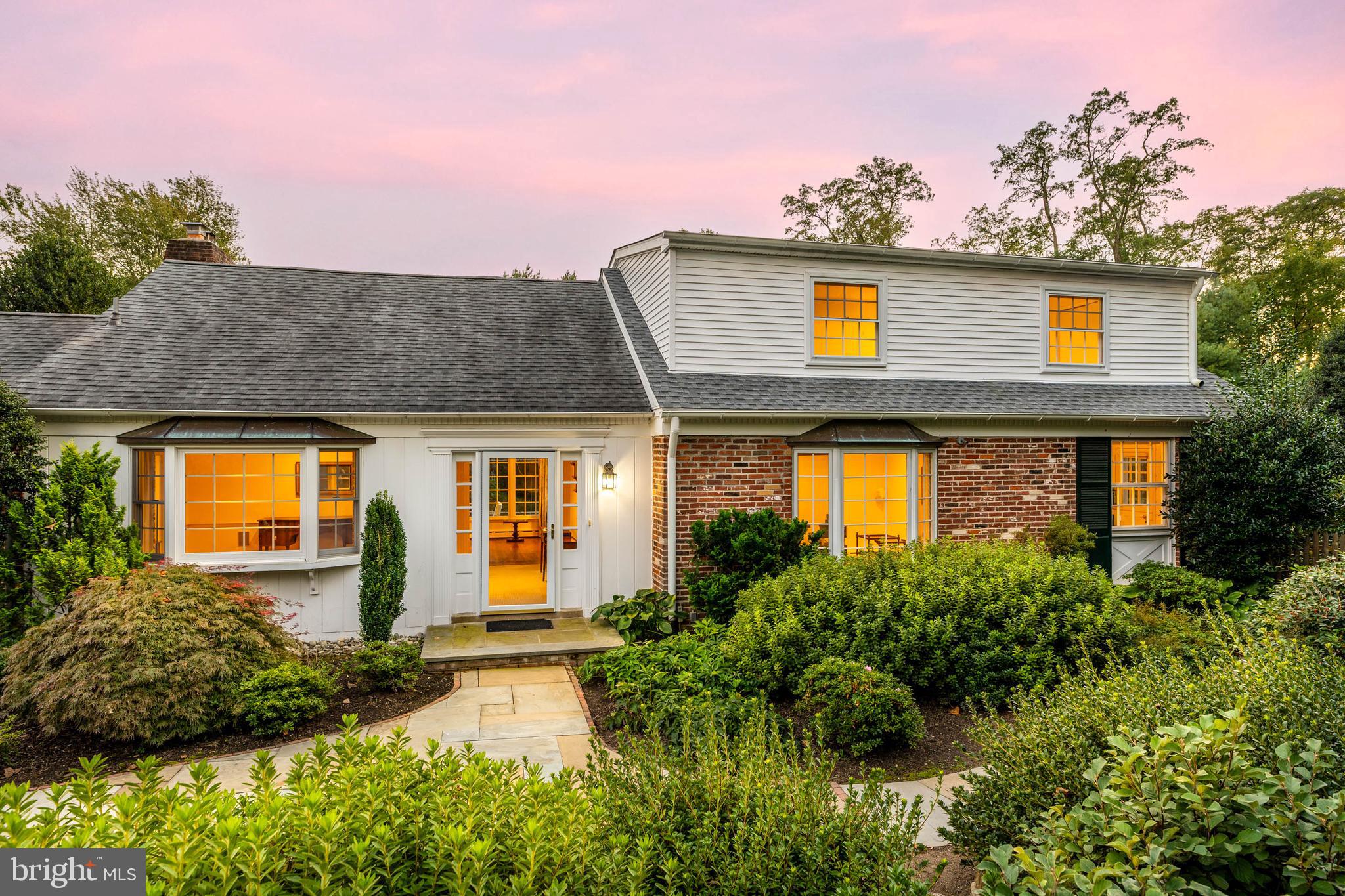 590 Cricket Lane Wayne, PA 19087 - Photo 2 of 65 a front view of house with yard and outdoor seating