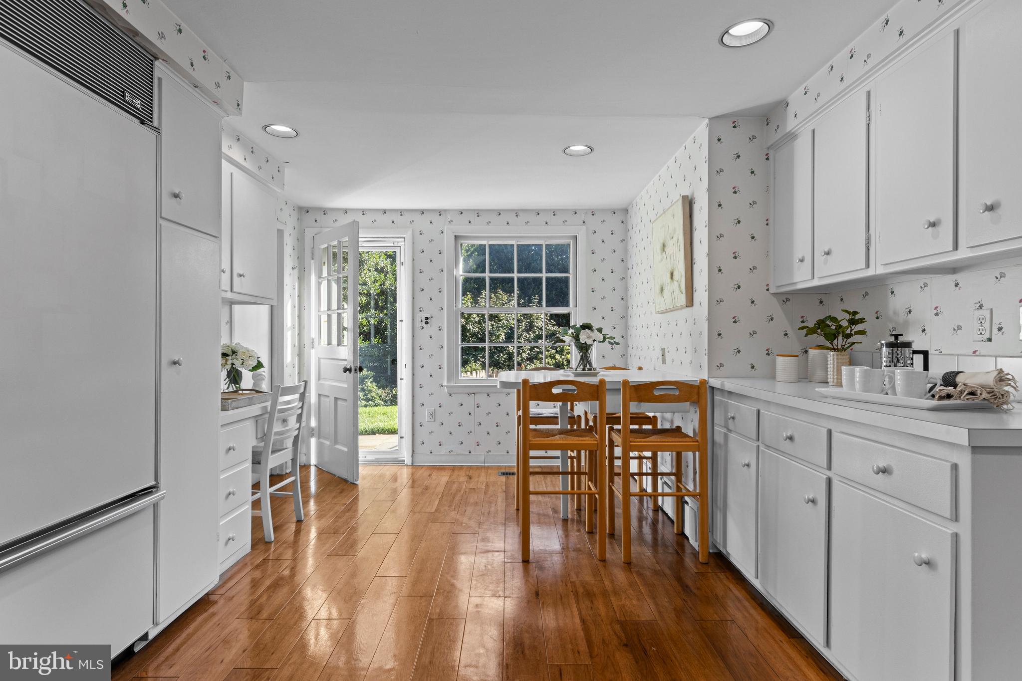 590 Cricket Lane Wayne, PA 19087 - Photo 23 of 65 a kitchen that has a lot of cabinets a sink and appliances in it