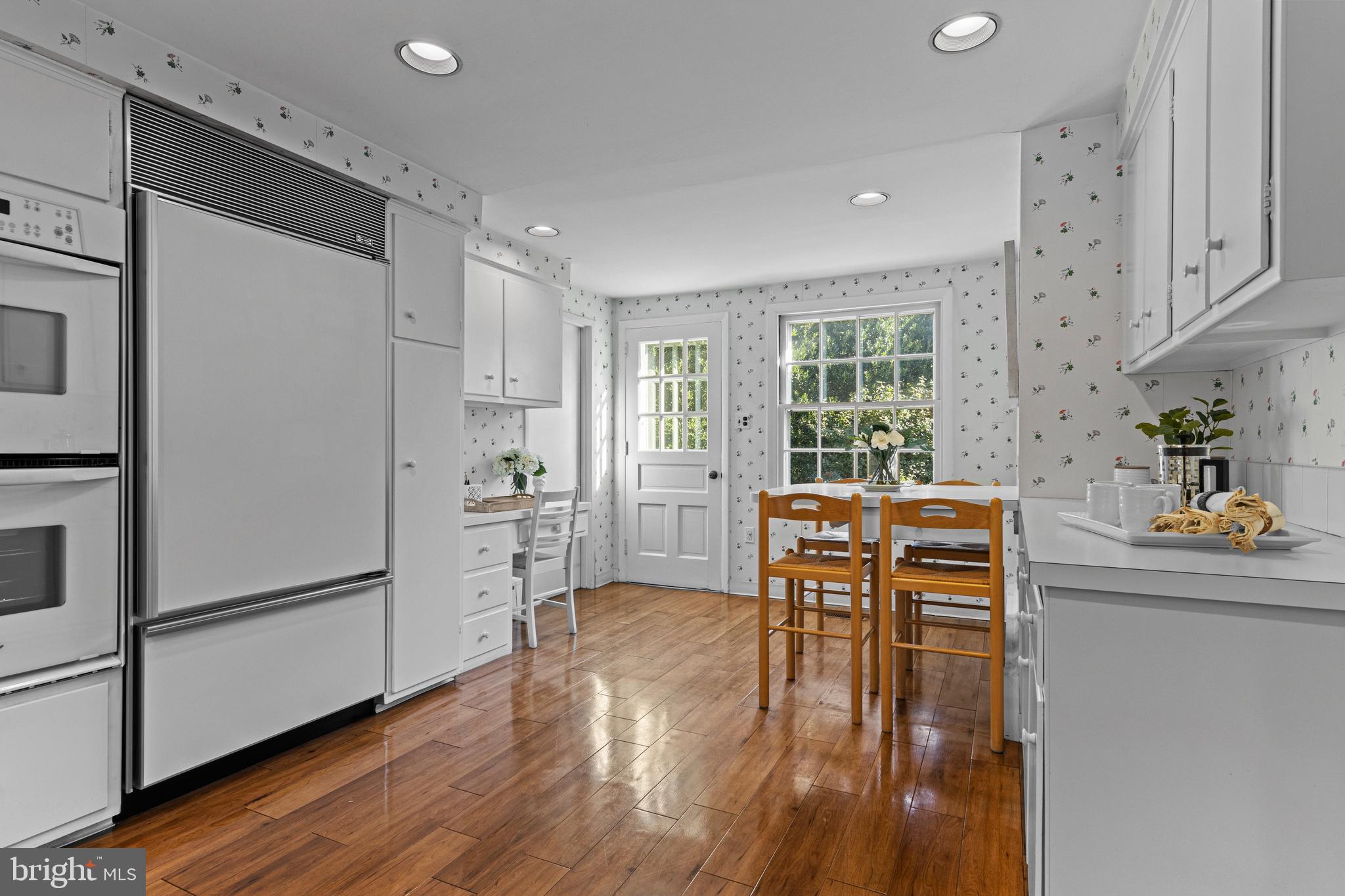 590 Cricket Lane Wayne, PA 19087 - Photo 26 of 65 a kitchen with stainless steel appliances granite countertop a refrigerator and a stove top oven