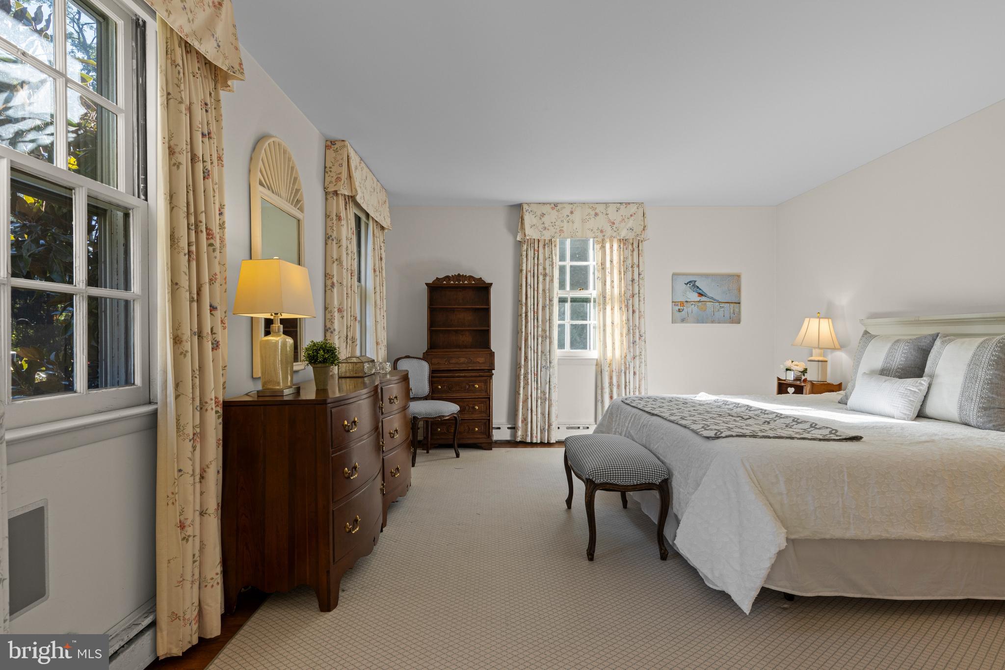 590 Cricket Lane Wayne, PA 19087 - Photo 35 of 65 a bedroom with a bed couch and windows