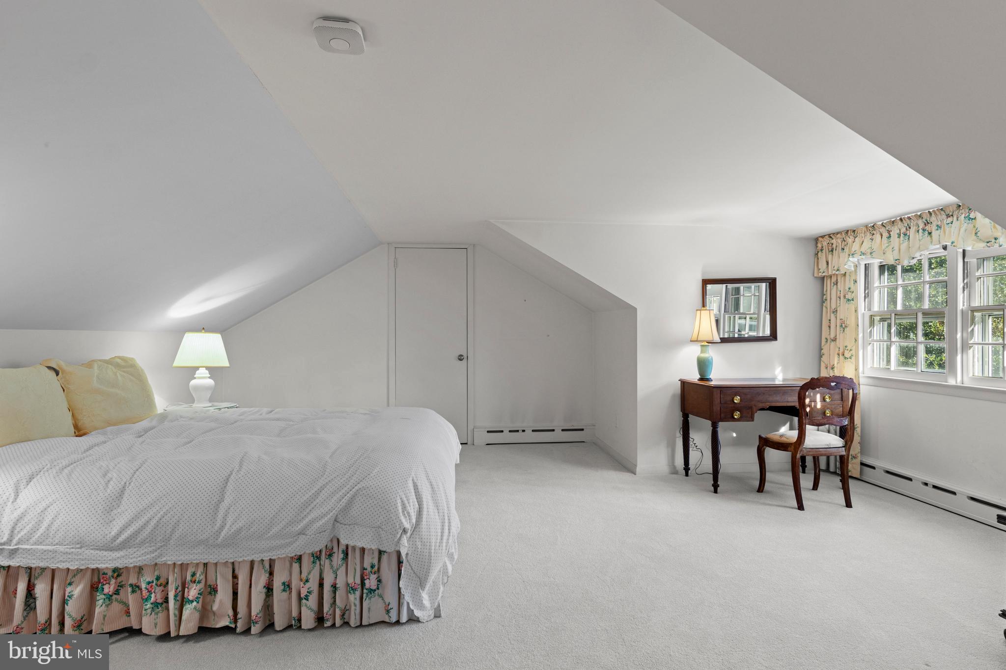 590 Cricket Lane Wayne, PA 19087 - Photo 41 of 65 a bedroom with a bed and a table in it