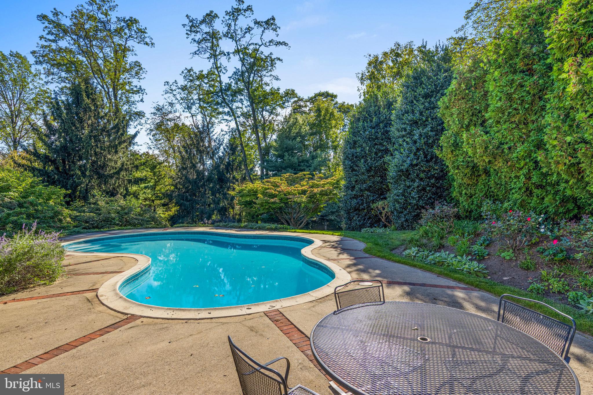 590 Cricket Lane Wayne, PA 19087 - Photo 51 of 65 a view of a swimming pool with a yard
