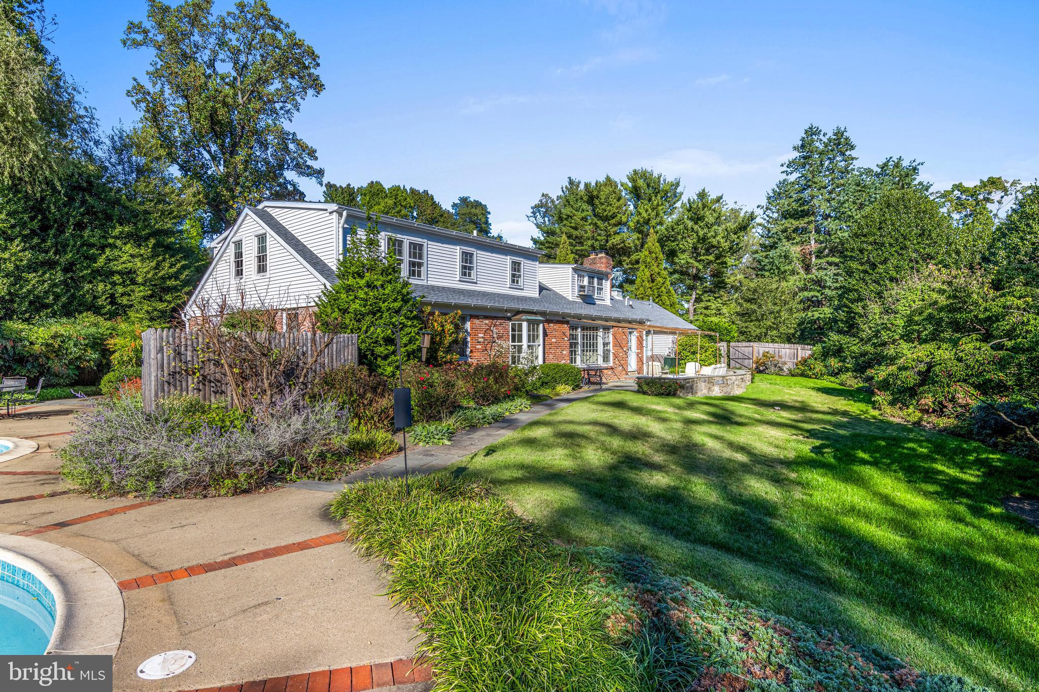 590 Cricket Lane Wayne, PA 19087 - Photo 56 of 65 a front view of a house with a yard