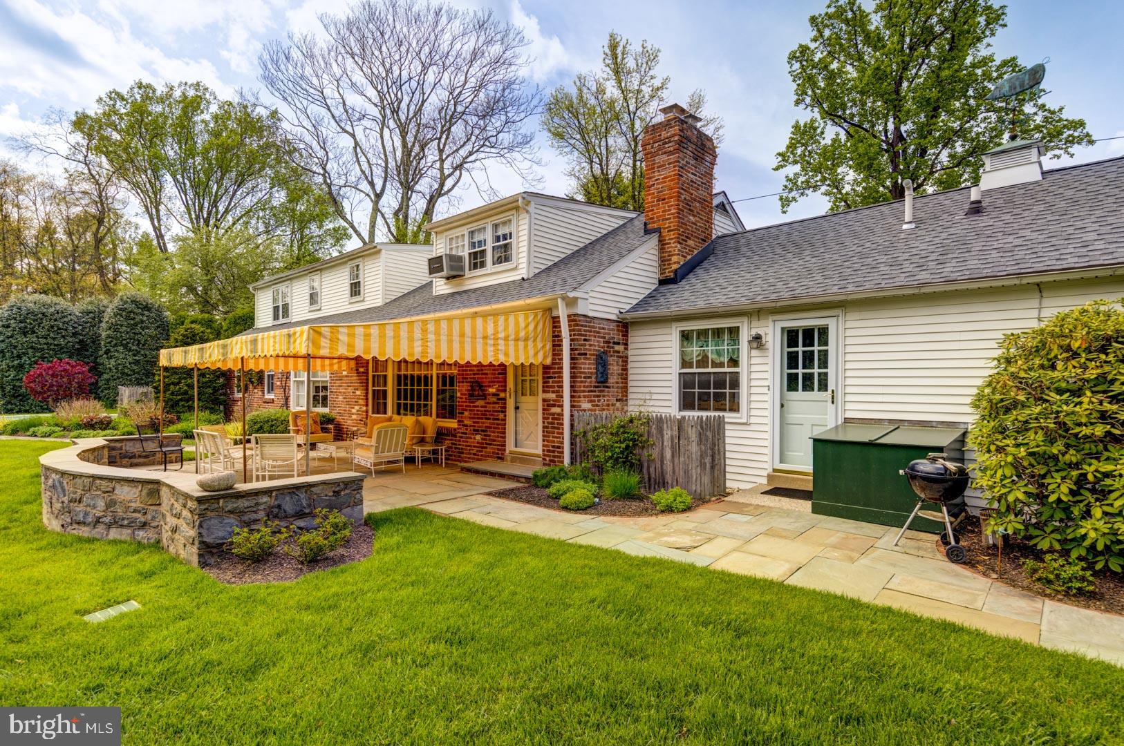 590 Cricket Lane Wayne, PA 19087 - Photo 60 of 65 front view of a house with a yard porch and sitting area