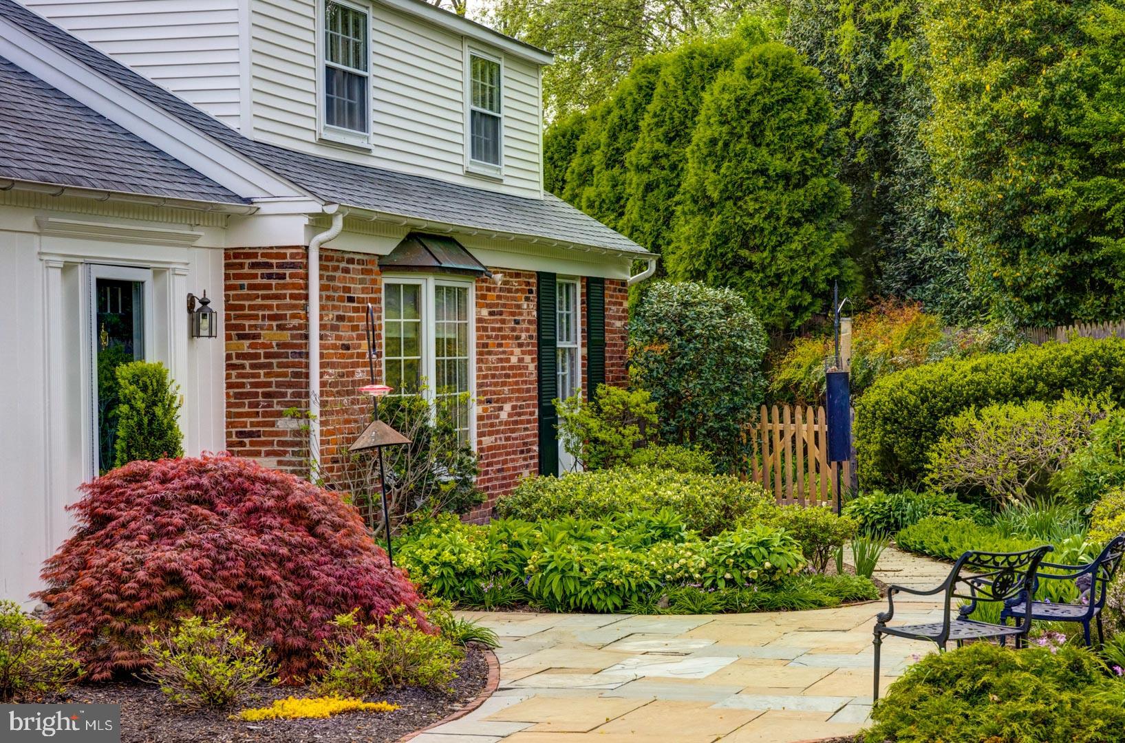 590 Cricket Lane Wayne, PA 19087 - Photo 62 of 65 a front view of a house with a yard