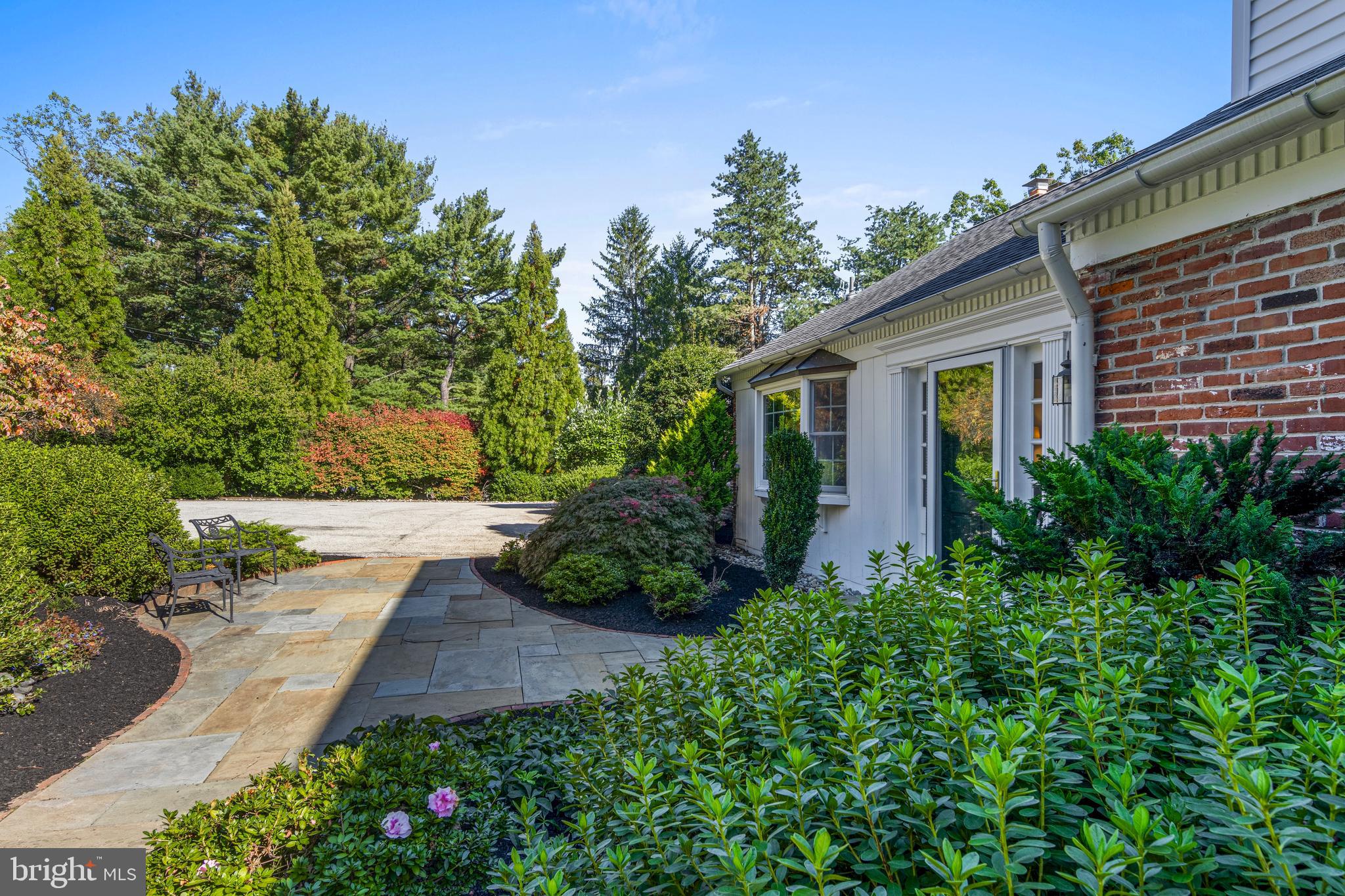 590 Cricket Lane Wayne, PA 19087 - Photo 63 of 65 a view of a house with a yard and potted plants