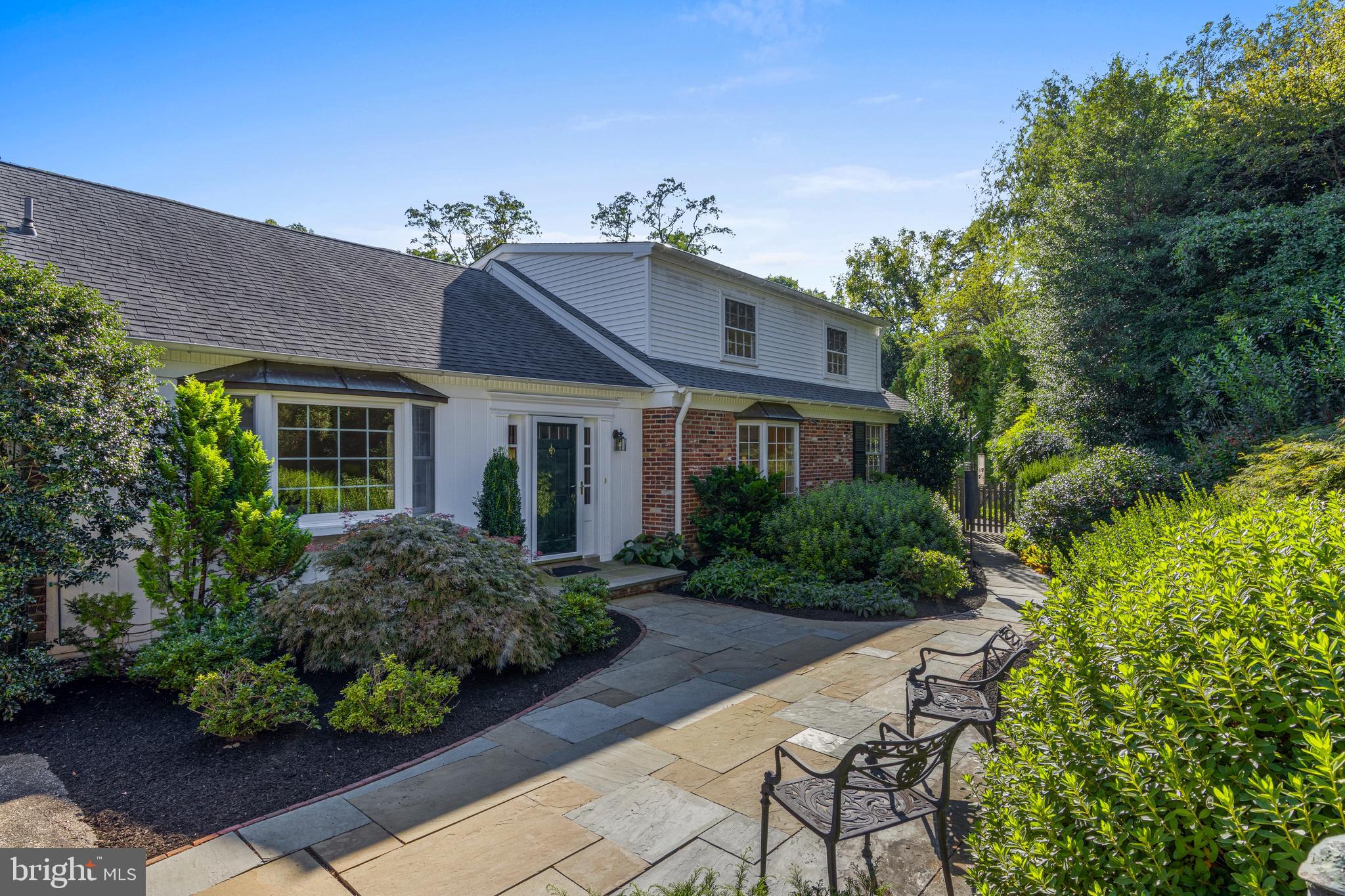 590 Cricket Lane Wayne, PA 19087 - Photo 9 of 65 a front view of a house with a yard