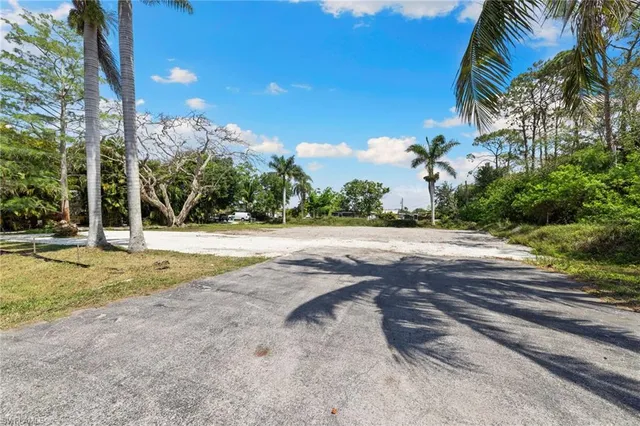 a view of swimming pool with a yard