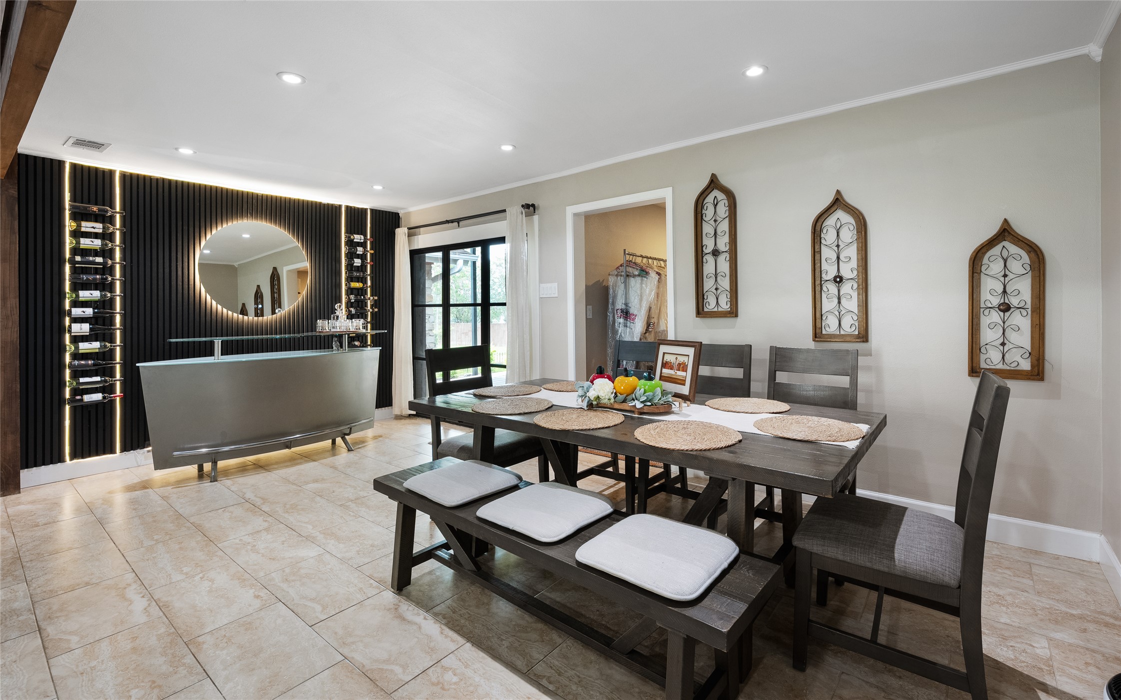 301 Oak Ridge Road Georgetown, TX 78628 - Photo 9 of 34 Tile flooring, recessed lighting, and a prominent feature wall with integrated wine storage define this open living area