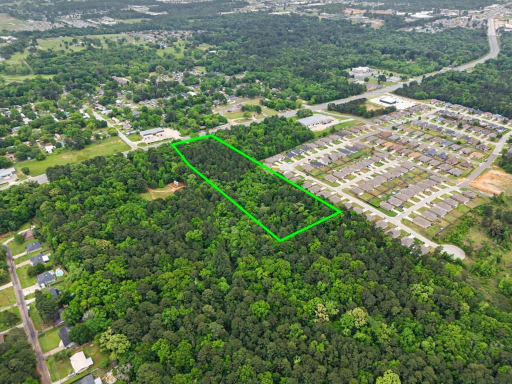4107 Judson Road Longview, TX 75605 - Photo 4 of 8 Expansive wooded parcel featuring mature trees, a rectangular shape, and surrounded by developed residential areas