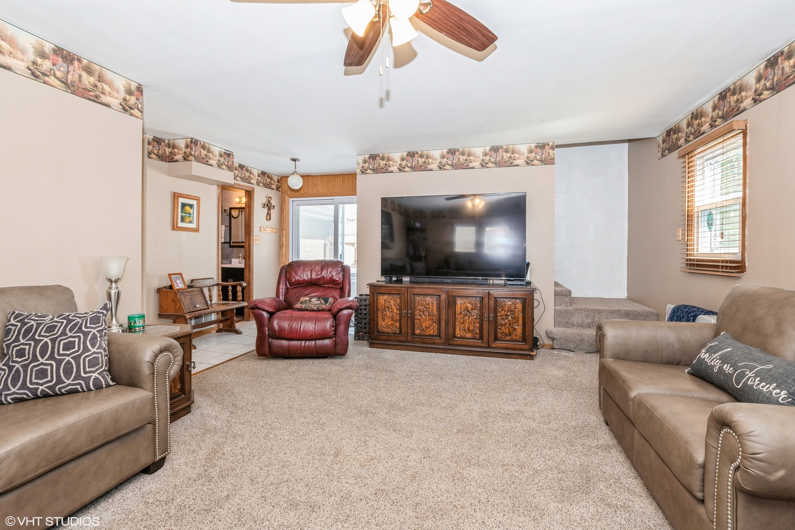 5837 109th Place Chicago Ridge, IL 60415 - Photo 9 of 20 a living room with furniture and a flat screen tv