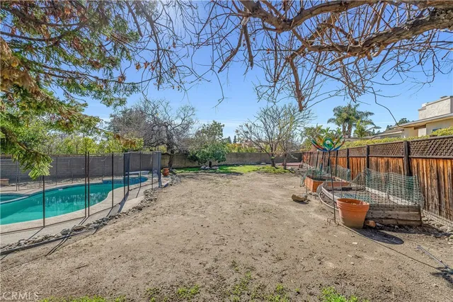 an aerial view of residential house with outdoor space
