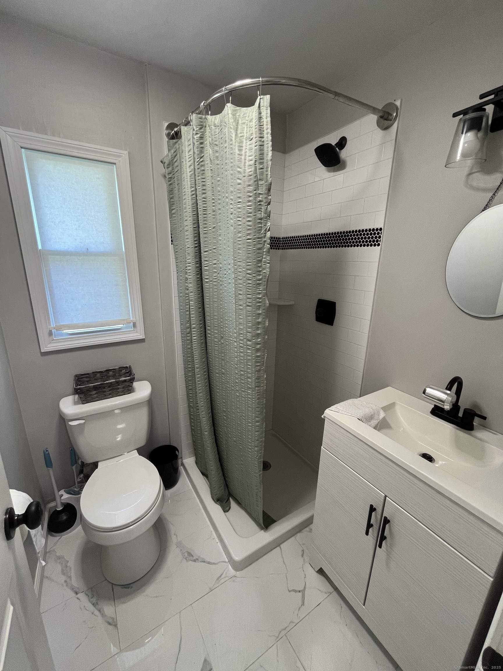 538 Winthrop Road Deep River, CT 06417 - Photo 8 of 11 a bathroom with a sink toilet and shower