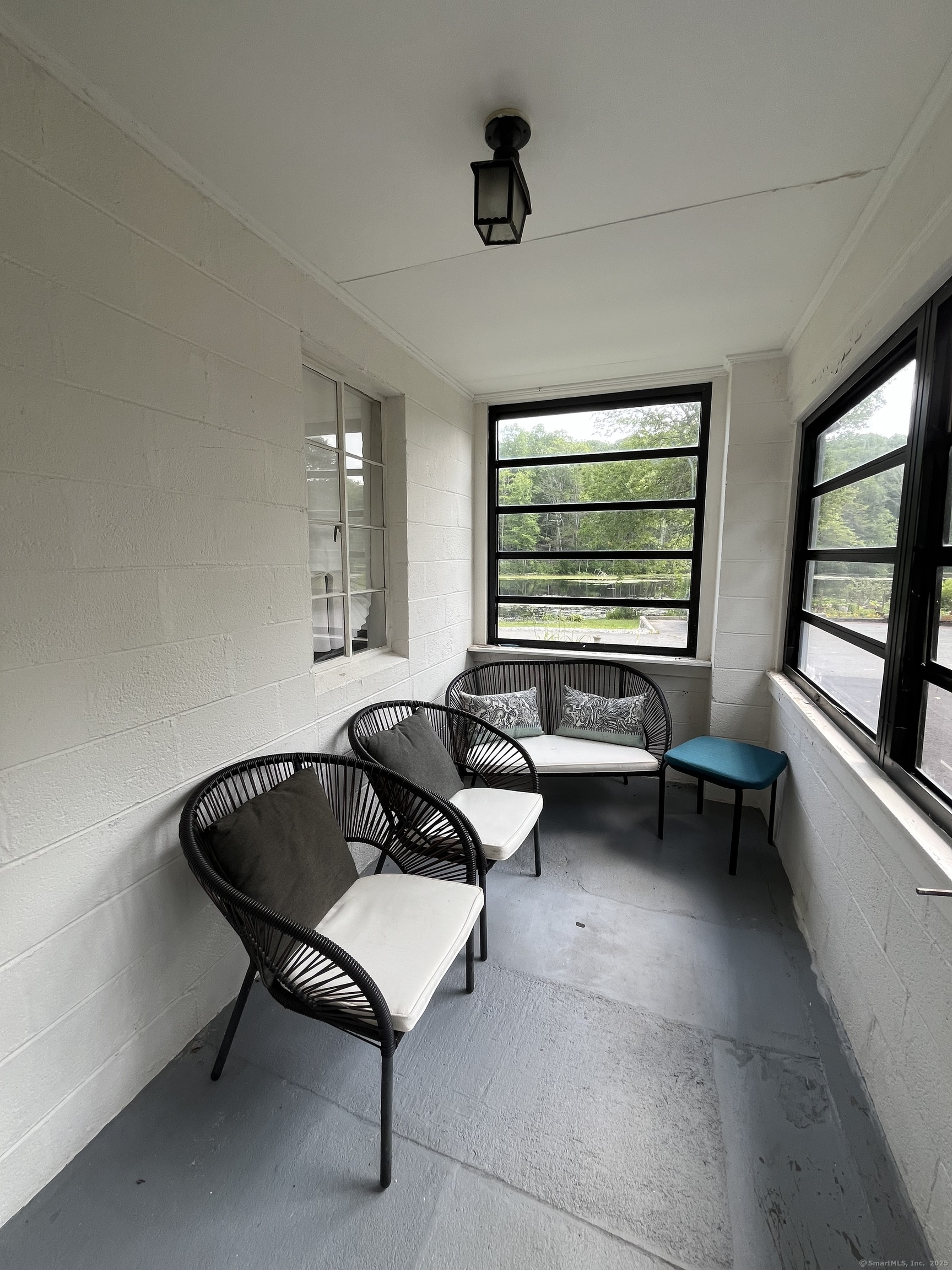 538 Winthrop Road Deep River, CT 06417 - Photo 10 of 11 a living room with furniture and a window