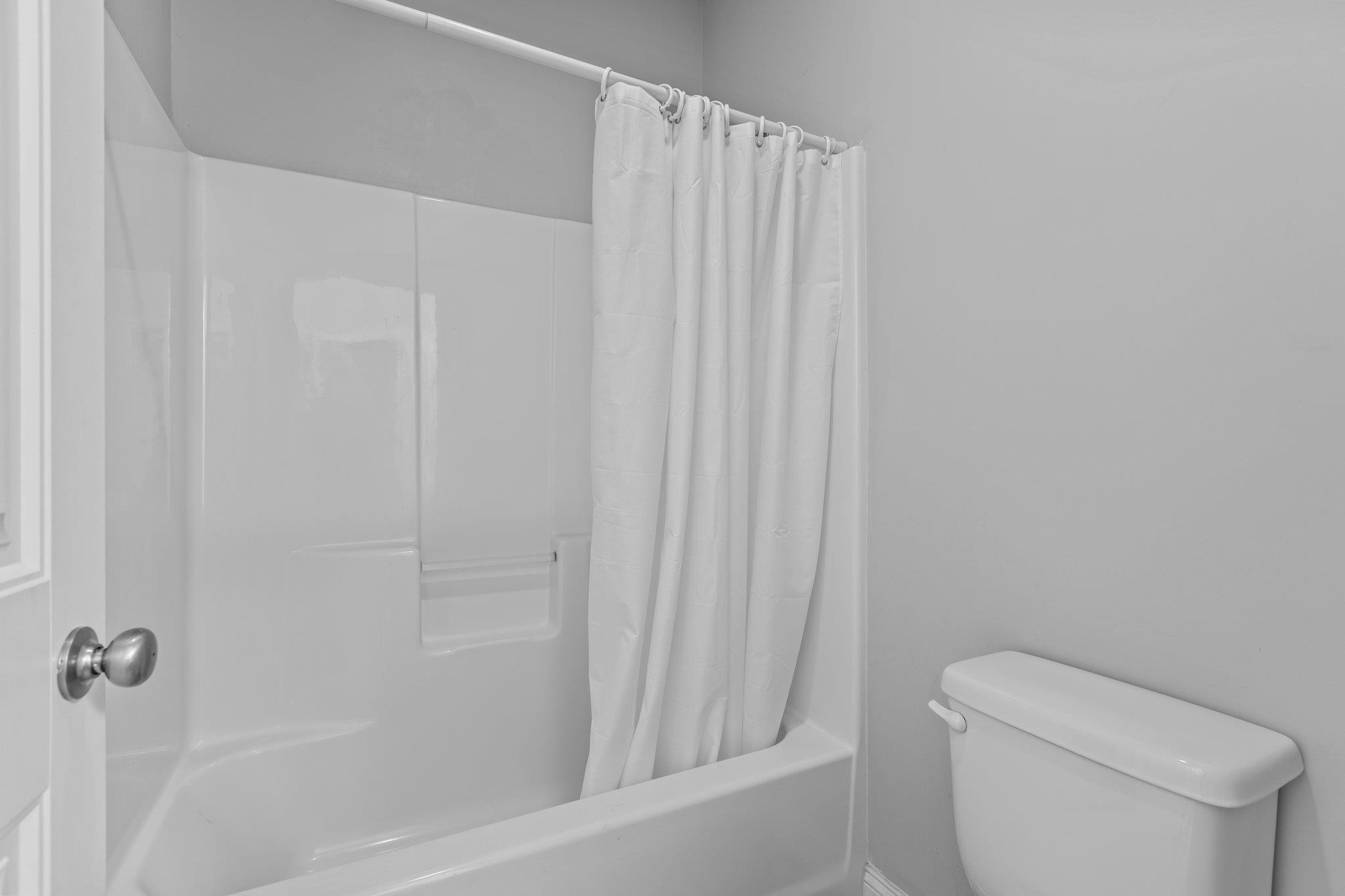 312 P G Pearce Road Zebulon, NC 27597 - Photo 31 of 57 Hall Bath Tub/Shower Area