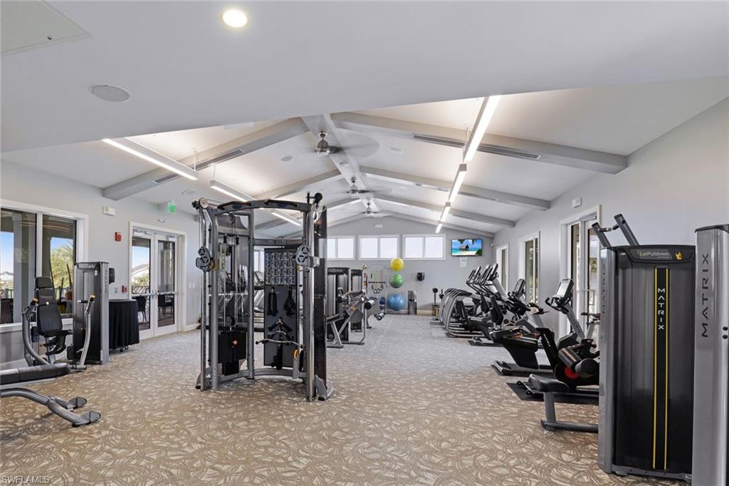 10787 Manatee Key Lane Estero, FL 33928 - Photo 31 of 31 a view of a room with gym equipment