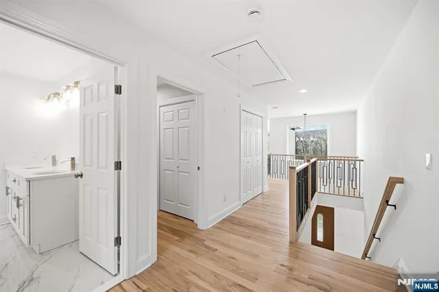 a view of kitchen with furniture and wooden floor